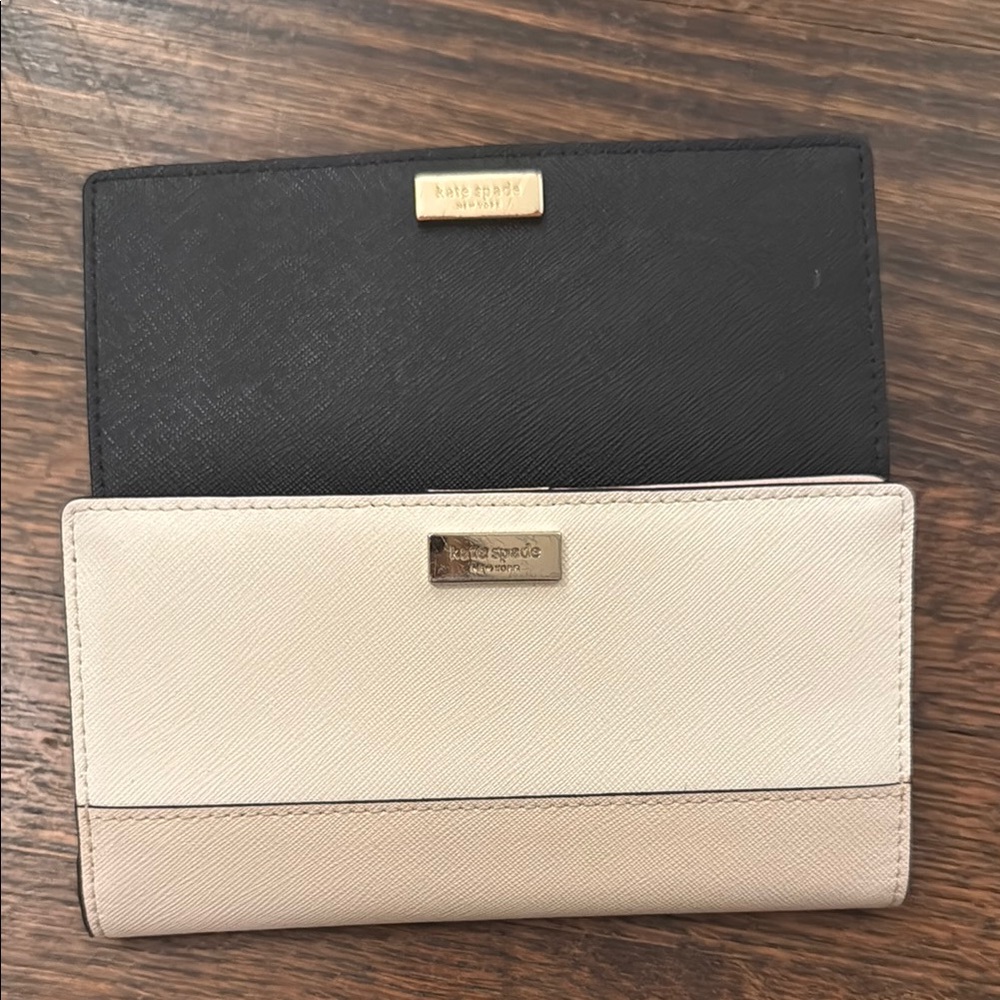Two for $20! One Kate Spade Two-Tone + One Kate Spade All Black Wallet.